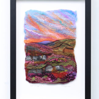 A depiction of an Irish mountain hillside against the setting sun